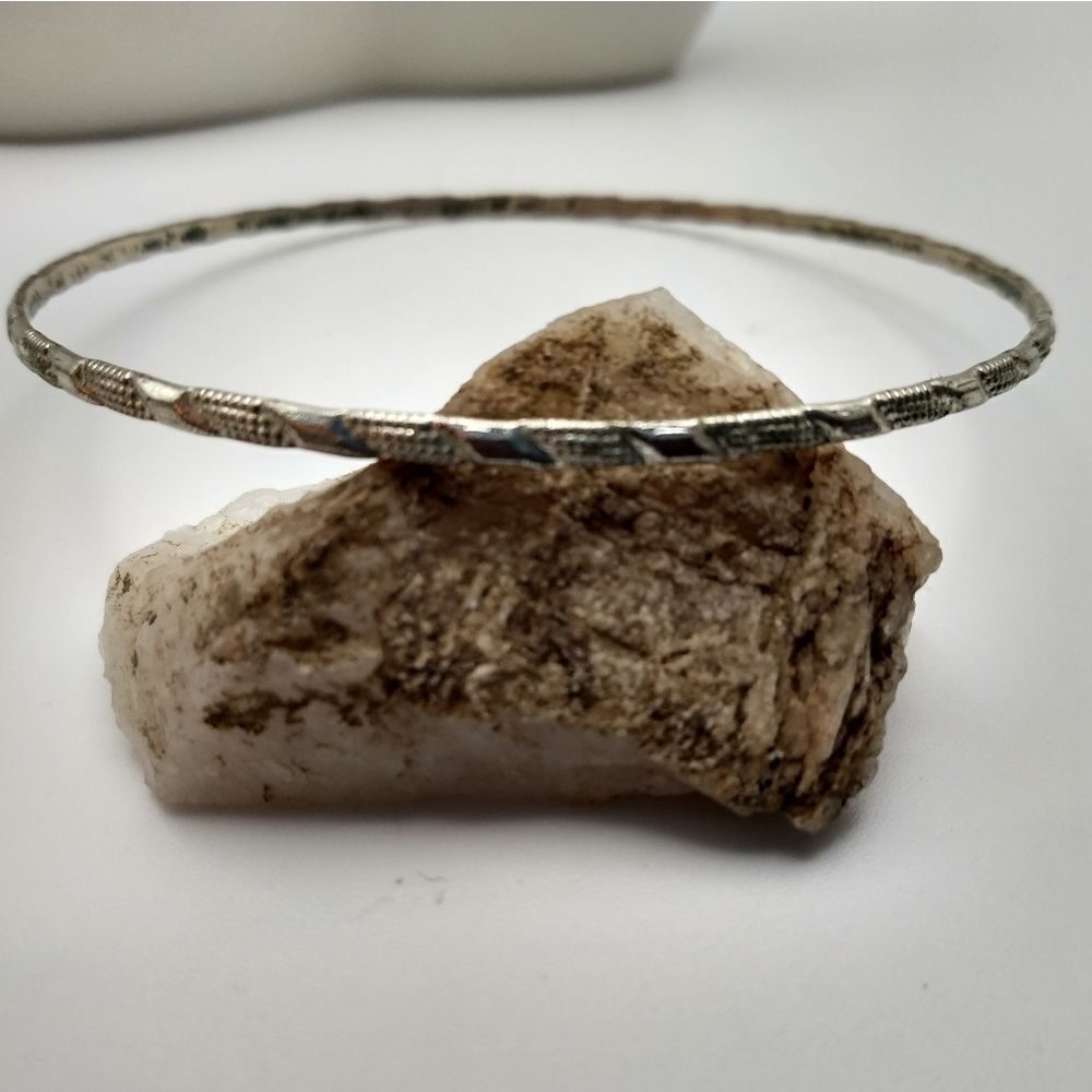 Silver toned Aztec tracks bracelet‎